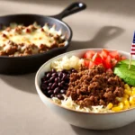 Ground beef burrito bowl with avocado, beans, and rice