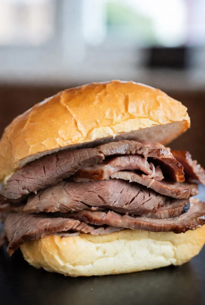Classic roast beef sandwich on a soft roll served fresh in NYC
